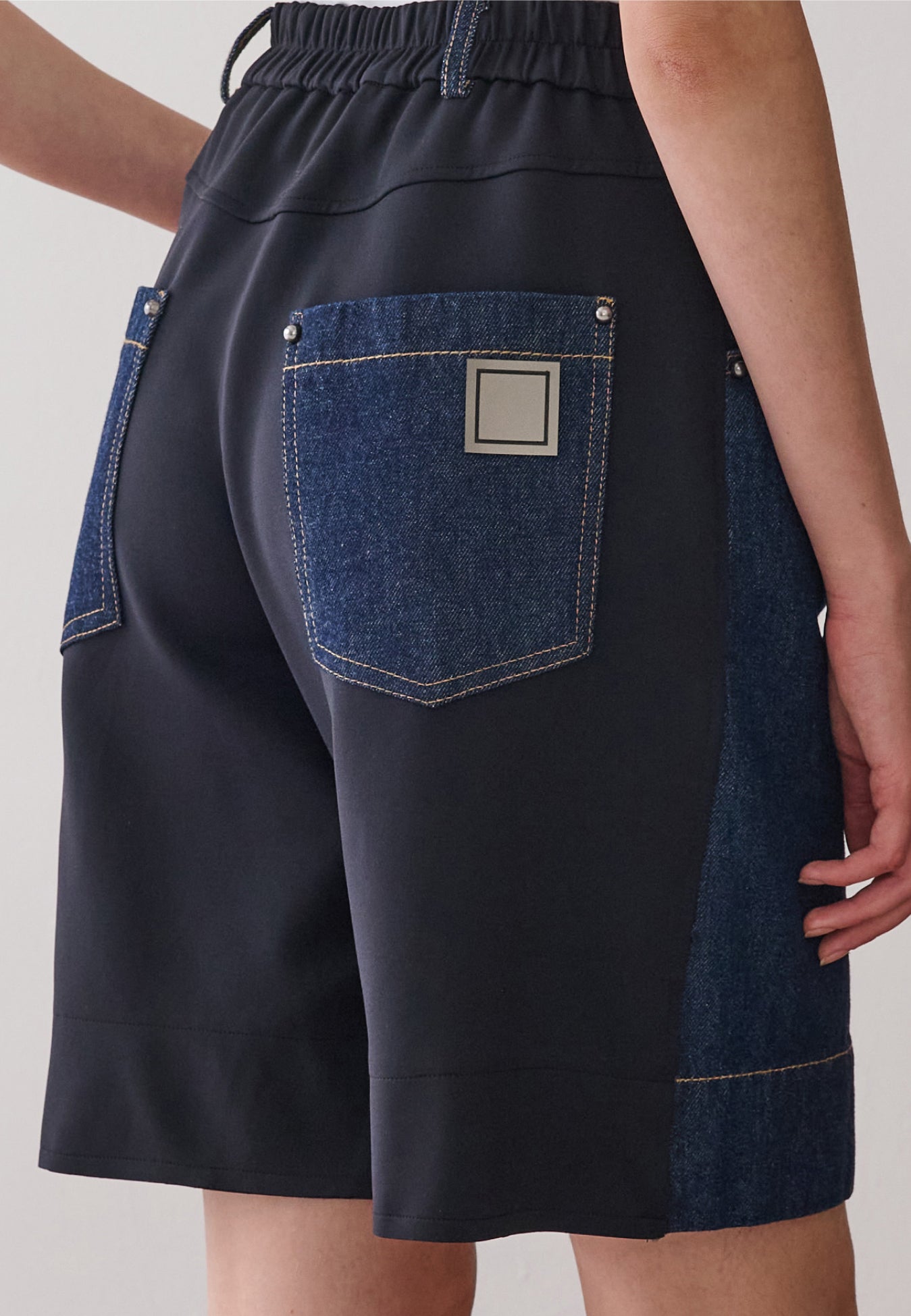 Bermuda Ampla Denim Tech