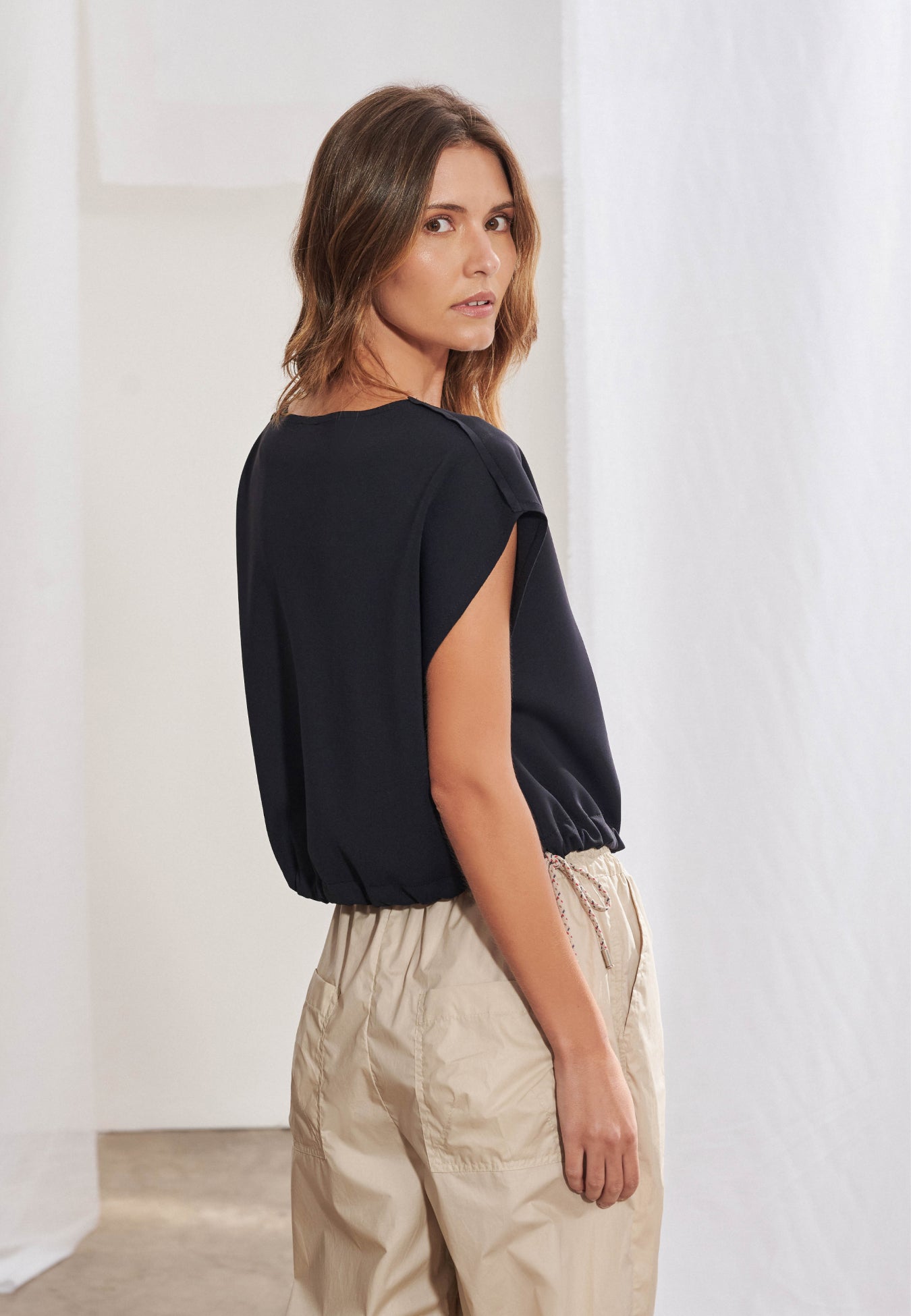 Blusa Zíper Barra Ajustável